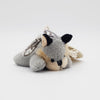 Front view of a small grey wolf  plush keyring