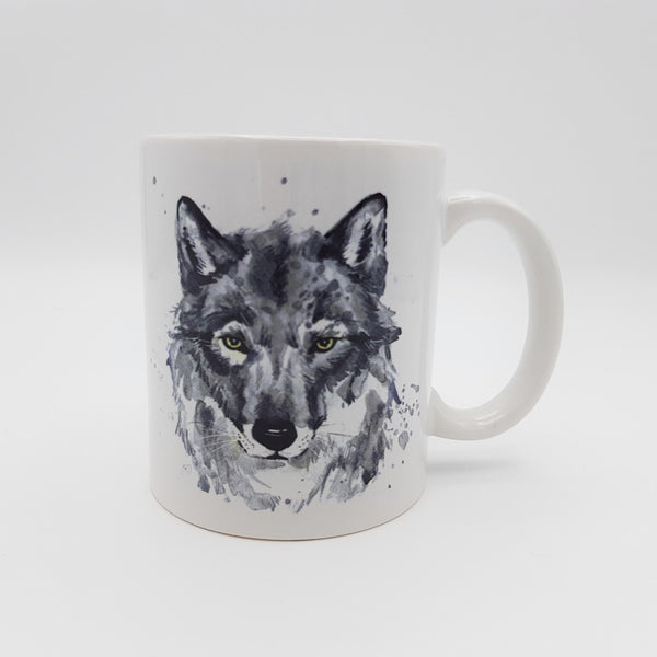 A white ceramic mug with a grey wolf watercolour design.