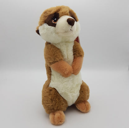 The side profile of a meerkat eco soft toy, with a white belly, brown eyes and tanned back, sat upright