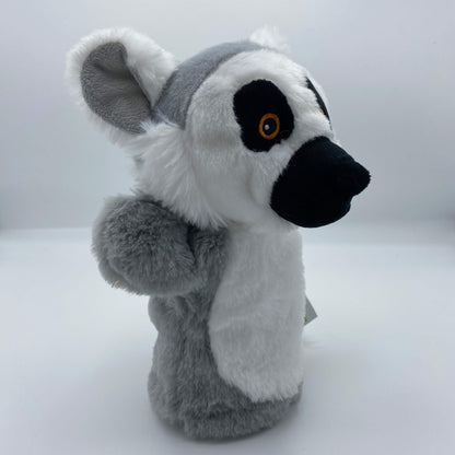 A white and grey ring tailed lemur hand puppet, with black eye markings and nose