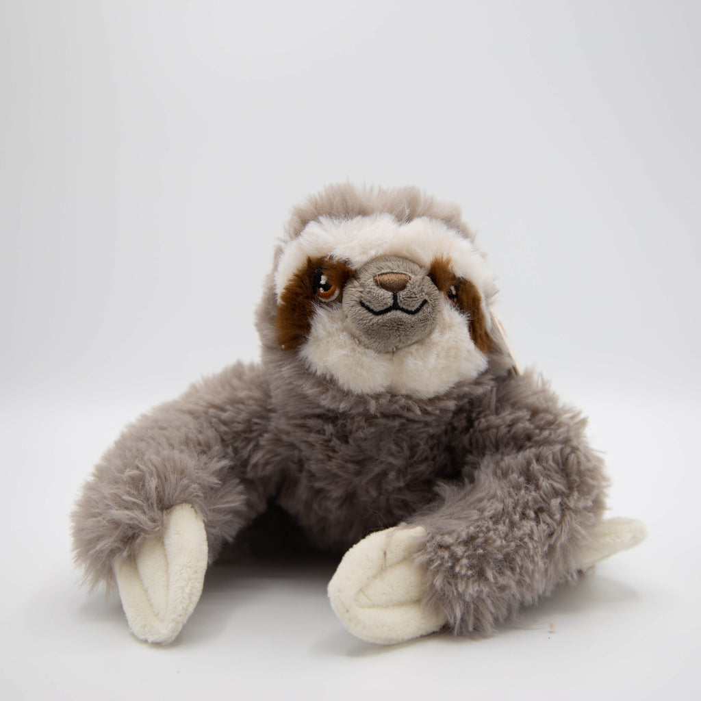 A smaller grey and white sloth eco soft toy, with brown eyes