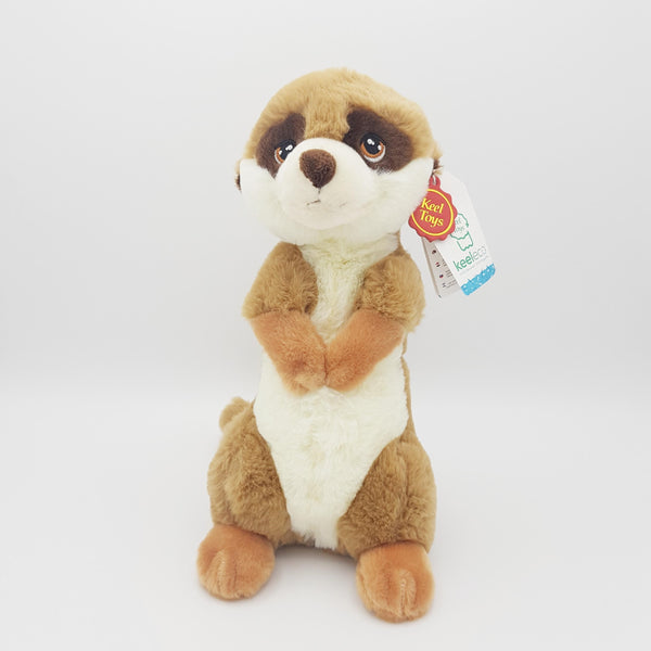 A meerkat eco soft toy, with a white belly, brown eyes and tanned back, sat upright
