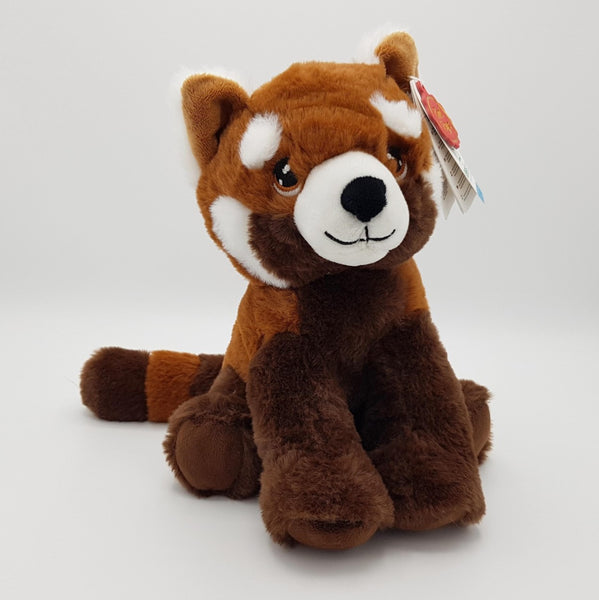 A large brown and orange red panda eco soft toy, with white cheeks, a stripey tail and white face.
